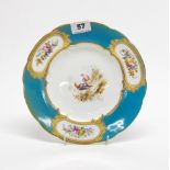 An early 19th century Sevres style hand painted and gilt porcelain plate, Dia. 24cm.