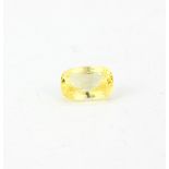 A large unmounted cushion cut yellow sapphire, approx. 7.52ct. With GIA certificate.