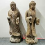 A pair of large cast grey concrete figures of the standing Buddha, H. 102cm. Both A/F to right