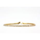 A 925 silver gilt stone set tennis bracelet, L. 20cm.