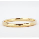 A hallmarked 9ct gold bangle, dia. 7.8cm.