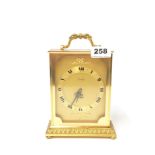 An Imhof gilt brass mantel clock, H. 21cm.