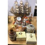 A model boat and a quantity of china and other items.