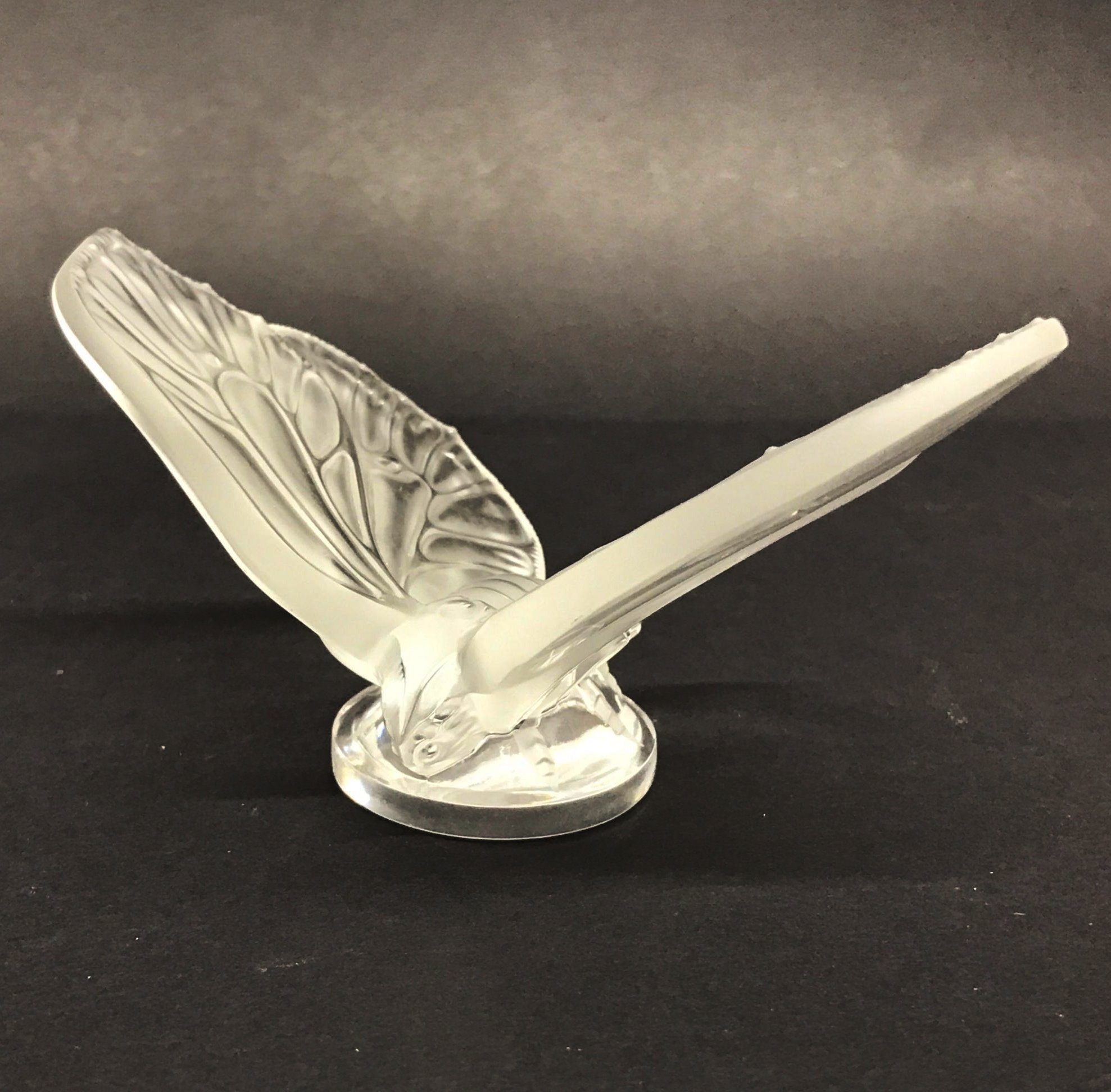 A Lalique crystal glass butterfly, H. 6cm, W. 11.5cm.