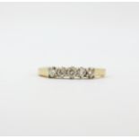 An 18ct yellow gold ring set with five brilliant cut diamonds, approx. 0.50ct total, (P.5).