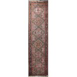 A hand woven Turkish wool runner, 262 x 80cm.