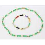 A 14ct yellow gold jade set necklace and bracelet, necklace L. 40cm.
