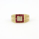 A gent's hallmarked 9ct yellow gold Rolex design ring set with diamonds surrounded by rubies, (V).
