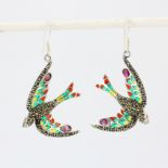 A pair of 925 silver and enamel bird shaped drop earrings each set with marcasite and an oval cut