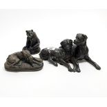 Three cold cast bronze figures, largest W. 26cm.