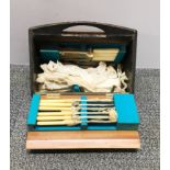 A stylish 1950's cutlery case and contents.