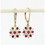 A pair of 9ct yellow gold drop earrings set with cabochon cut opal and rubies, L. 3cm.