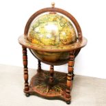 A vintage globe drinks trolley (no hinge mechanism or fitting for lid) H. 94cm.