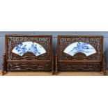 A pair of Chinese hardwood framed hand painted porcelain table screens, 50 x 38cm.