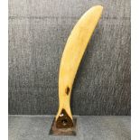 A vintage American Propellors Ltd oak Paragon half propellor mounted on a steel plate, H. 130cm.