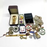 A quantity of costume jewellewry, watches and other items.