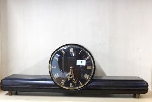 A stylish 1950's Japanese AICHI chiming mantel clock, W. 64cm.