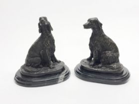 A pair of bronze figures of dogs on marble bases, H. 19cm.