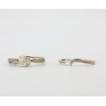 Two hallmarked 9ct white gold diamond set rings, (M.5).