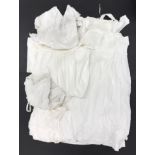 A group of antique babies christening and night gowns.