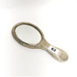 A Chester hallmarked silver hand mirror, L. 24.5cm.