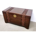 An Oriental carved teak and camphor wood lined blanket chest, 100 x 50 x 55cm.