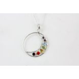 A large 925 silver pendant set with amethyst, sapphire, aquamarine, peridot, citrine, and garnet,