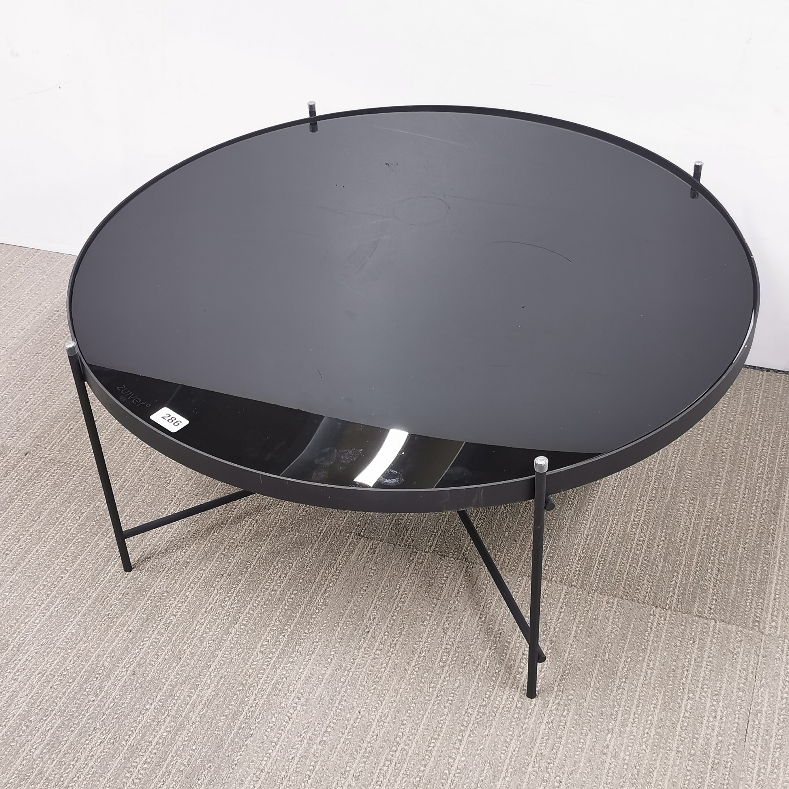 A Zuiver plate glass topped metal coffee table, Dia. 81cm H. 33cm. - Image 2 of 3