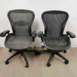 Two genuine Herman Miller Aeron, adjustable office chairs, H. 94cm.