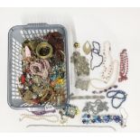 A basket of costume jewellery.