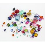 A quantity of mixed unmounted gemstones.