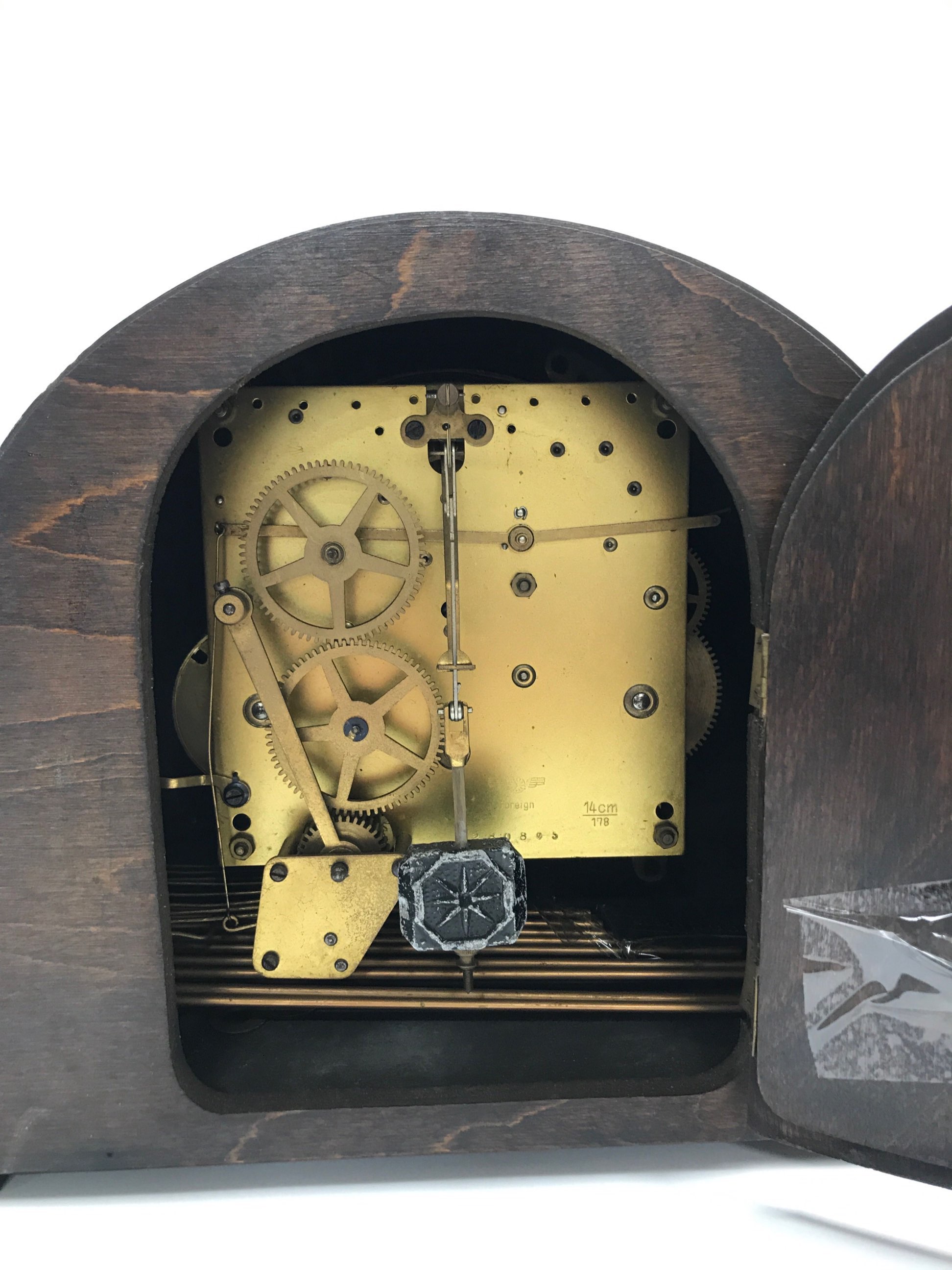 A 1930's chiming oak veneered mantel clock, H. 22cm. - Image 3 of 3