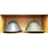 Two military helmets.