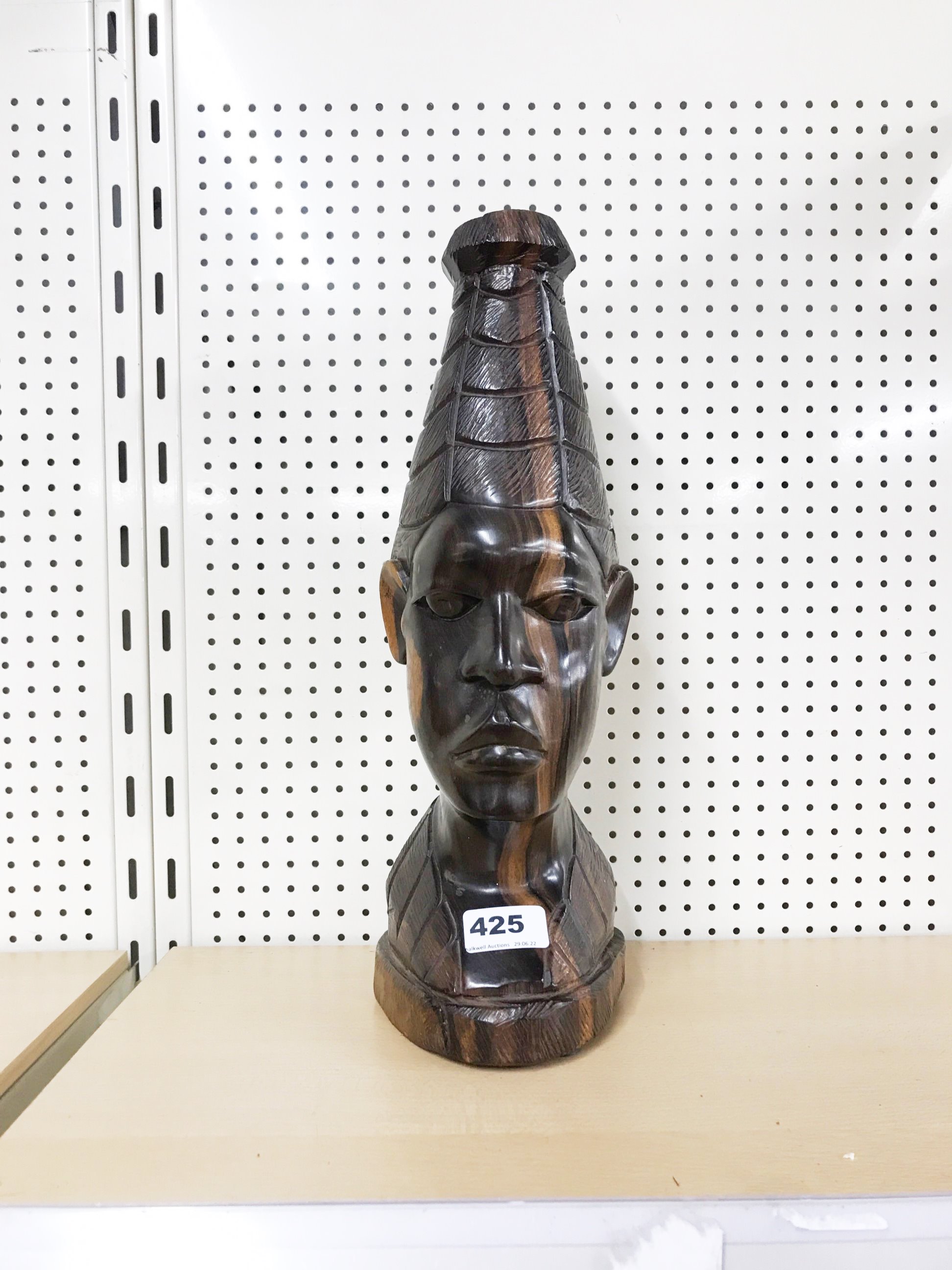 A large carved African figured ebony torso table lamp base, H. 39cm.