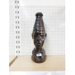 A large carved African figured ebony torso table lamp base, H. 39cm.