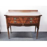 A plate glass topped carved mahogany Beresford and Hicks, London, cutlery cabinet.
