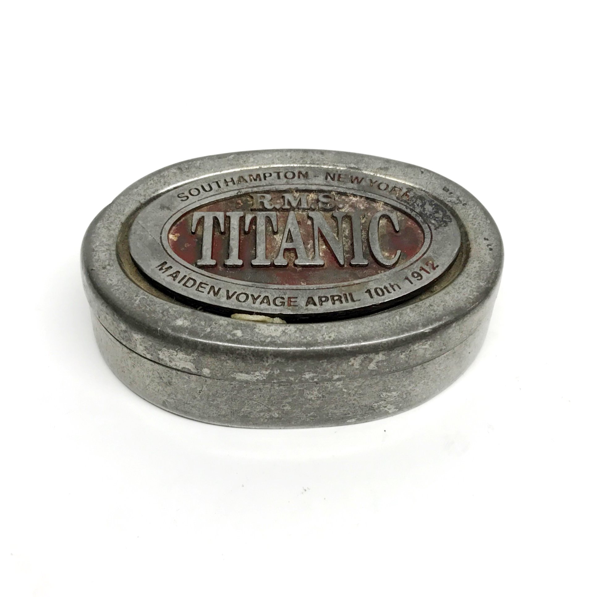 A rare English pewter box commemorating the maiden voyage of the RMS Titanic on April 10th 1912,