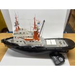 A large radio controlled plastic model fishing boat, L. 102cm.