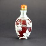 A Chinese three layer signed carved Peking cameo glass snuff bottle with gilt metal and coral