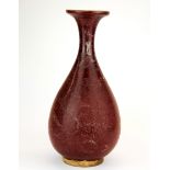 A Chinese sang de boeuf glazed porcelain vase, H. 33cm.