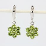 A pair 925 silver drop earrings set with round cut peridot, L. 3.5cm.