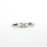 A hallmarked 9ct white gold solitaire ring set with a brilliant cut diamond, approx. 0.30ct, with