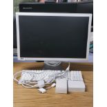 An Apple Cinema HD Display unit with keyboard, screen size 23".