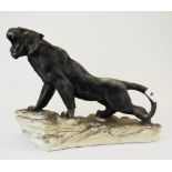 A 1930's 'chalk figure' of a roaring big cat, L. 41cm. H 31cm.