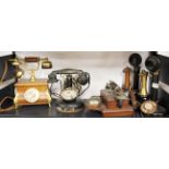 Two early stick telephones, a French telephone, a wall mounted extension phone and a French