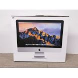 A boxed Apple iMac, screen size 21.5" (Model no. A1418).