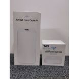 A 2TB AirPort Time Capsule (ME177B/A, 802.11ac, Serial no. C86SC0KDF9HS), together with a 802.11n
