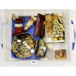 An interesting box of odds including jewellery, compacts etc.