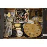 A box of watches, watch parts, clocks and clock parts.