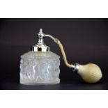 A Lalique frosted crystal atomizer perfume bottle decorated with putti, H. 13cm. slightly A/F to